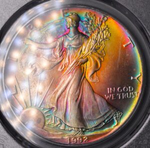 MONSTER RAINBOW TONED! 1992 American Silver Eagle PCGS MS-65 BEAUTIFUL 3-D RAINBOWS!